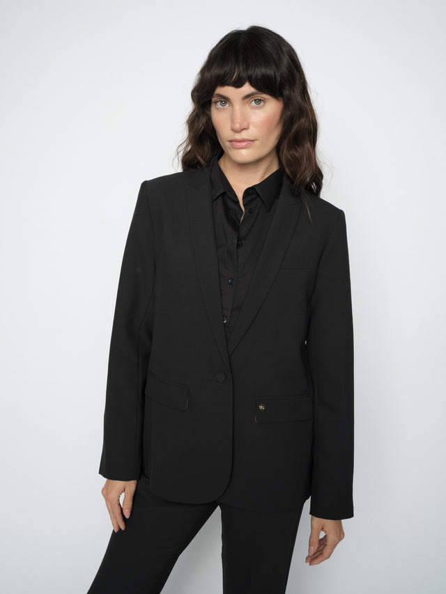 Women's black single-button blazer with classic lapels and flap pockets