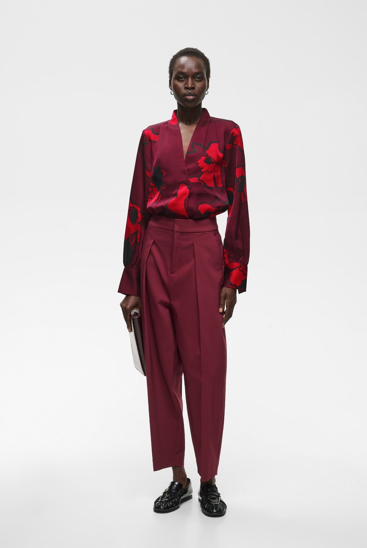 Burgundy floral print V-neck blouse with long sleeves and blouson silhouette