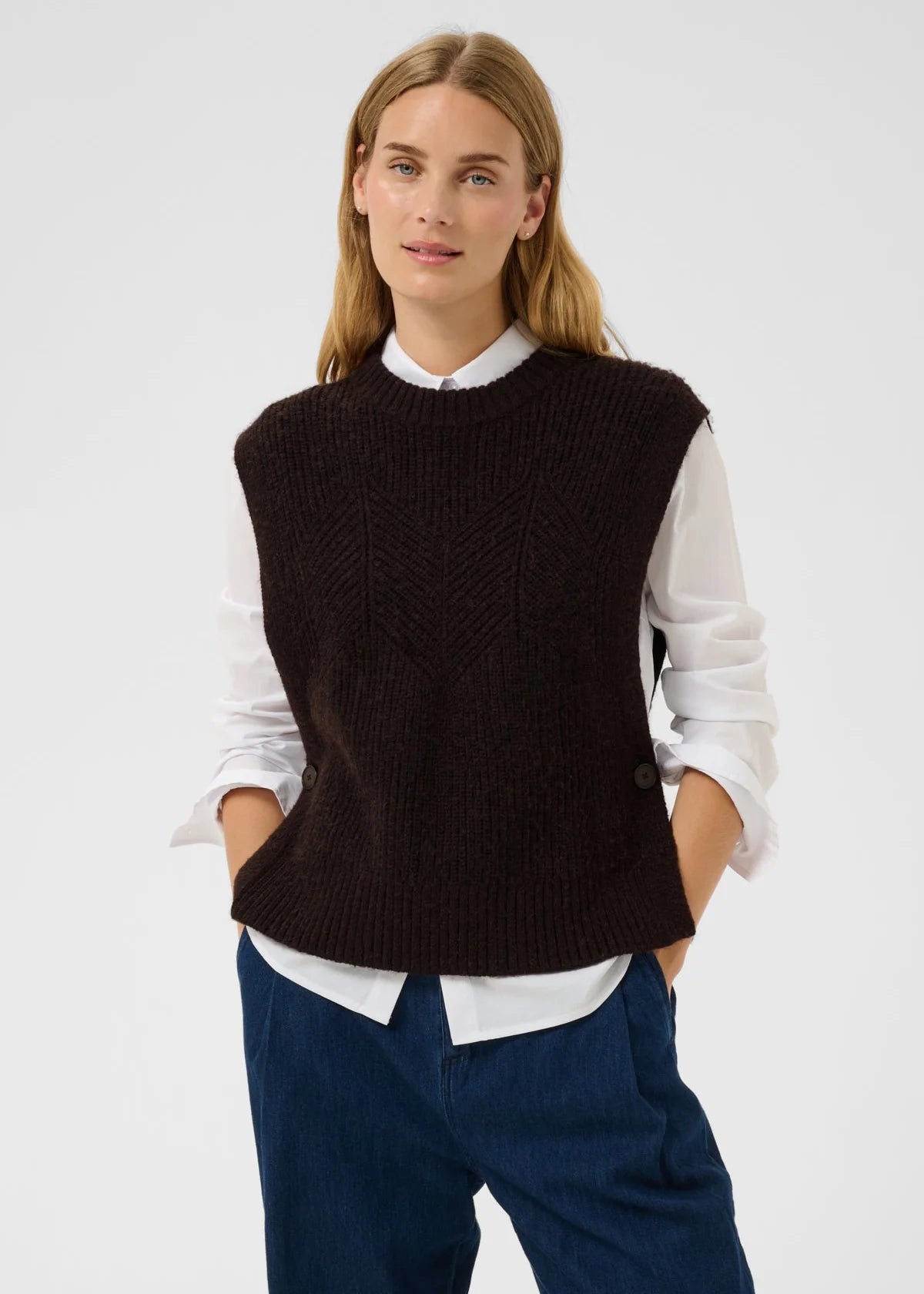 Dark brown cable-knit sleeveless waistcoat with side buttons and crew neck