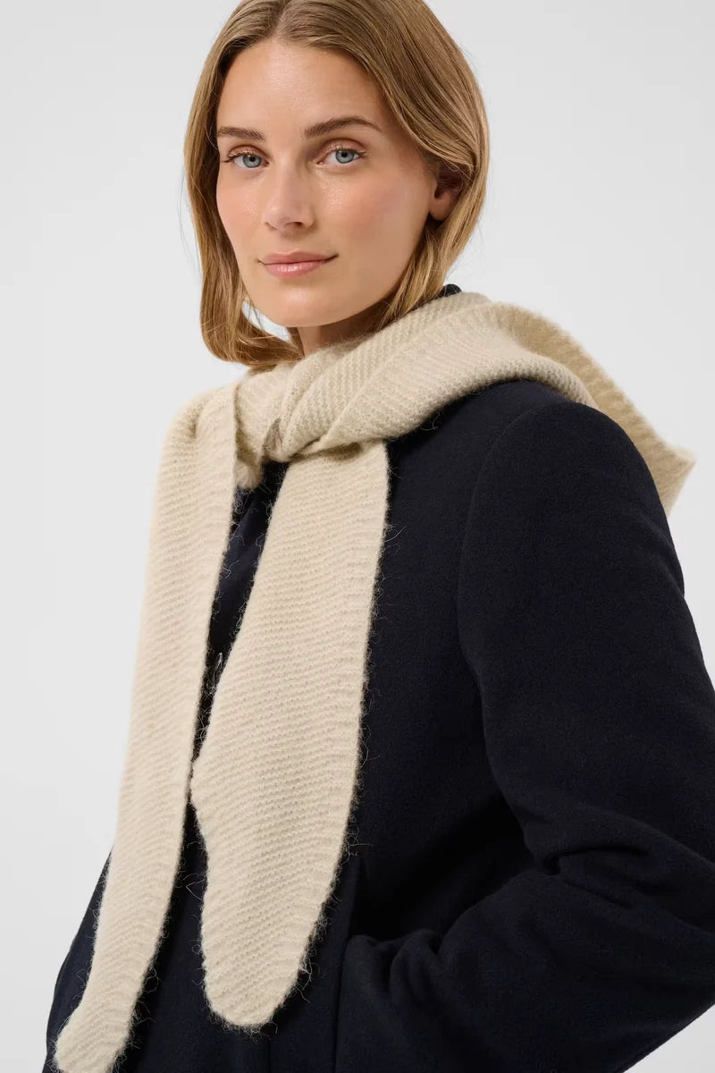 Part Two Charline beige knit scarf styled around neck over navy coat