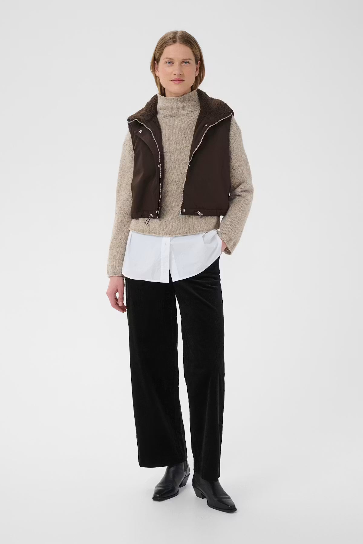 Part Two CATHLIN dark brown cropped sherpa vest worn over beige turtleneck sweater