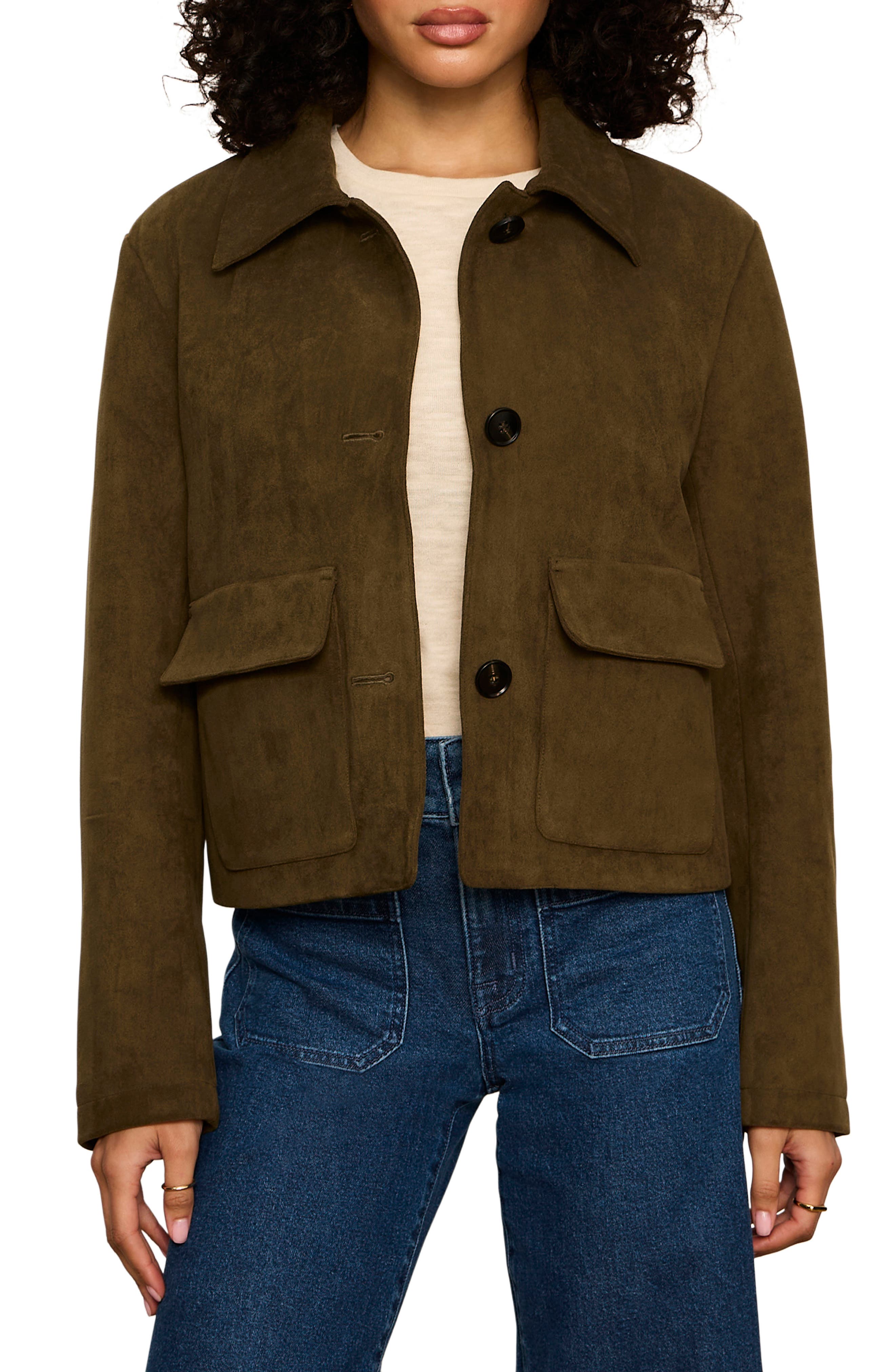 Woman wearing Sanctuary Avid Suede Jacket in olive green with button front and patch pockets