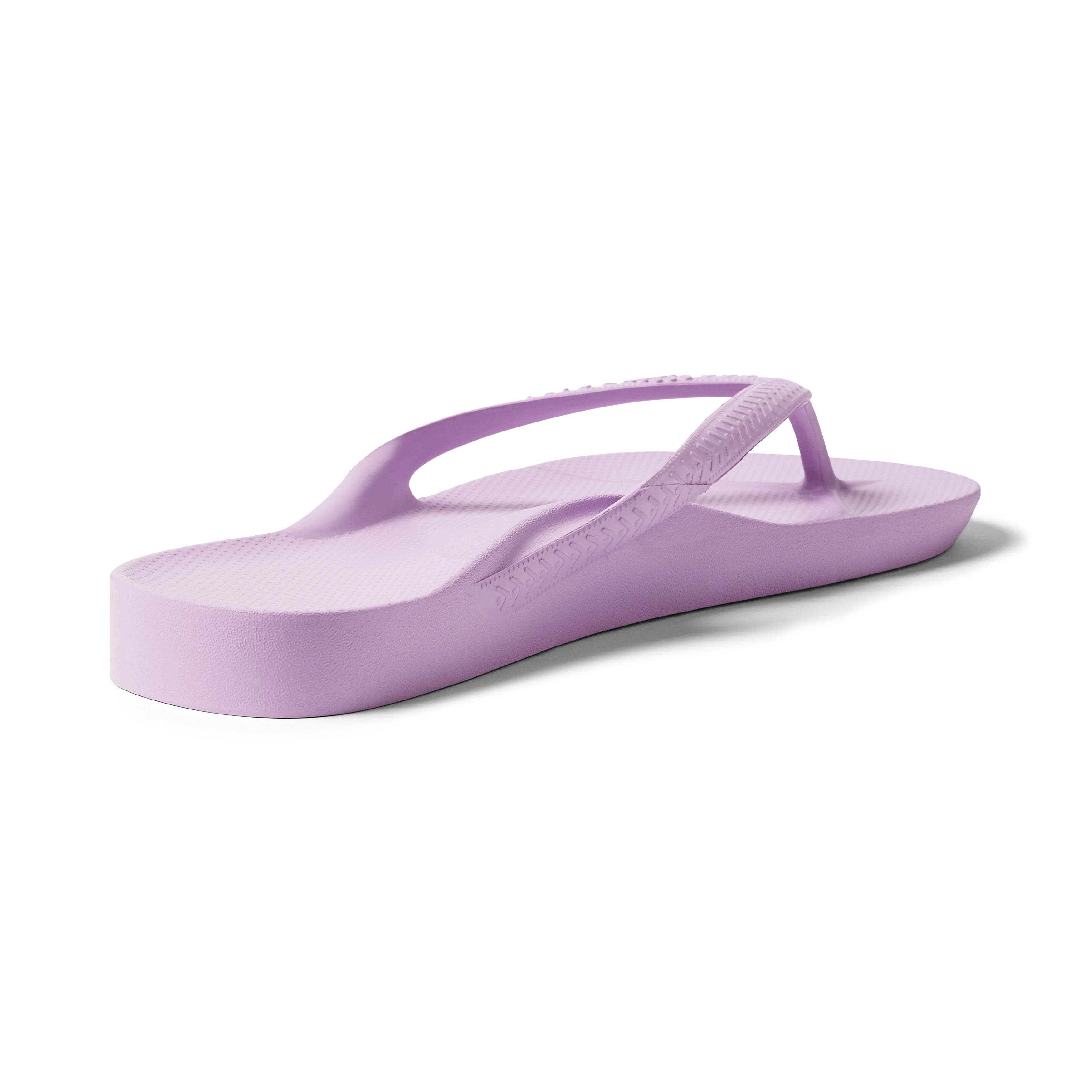Archies Arch Support Flip Flops in lilac purple shown from rear angle on white background
