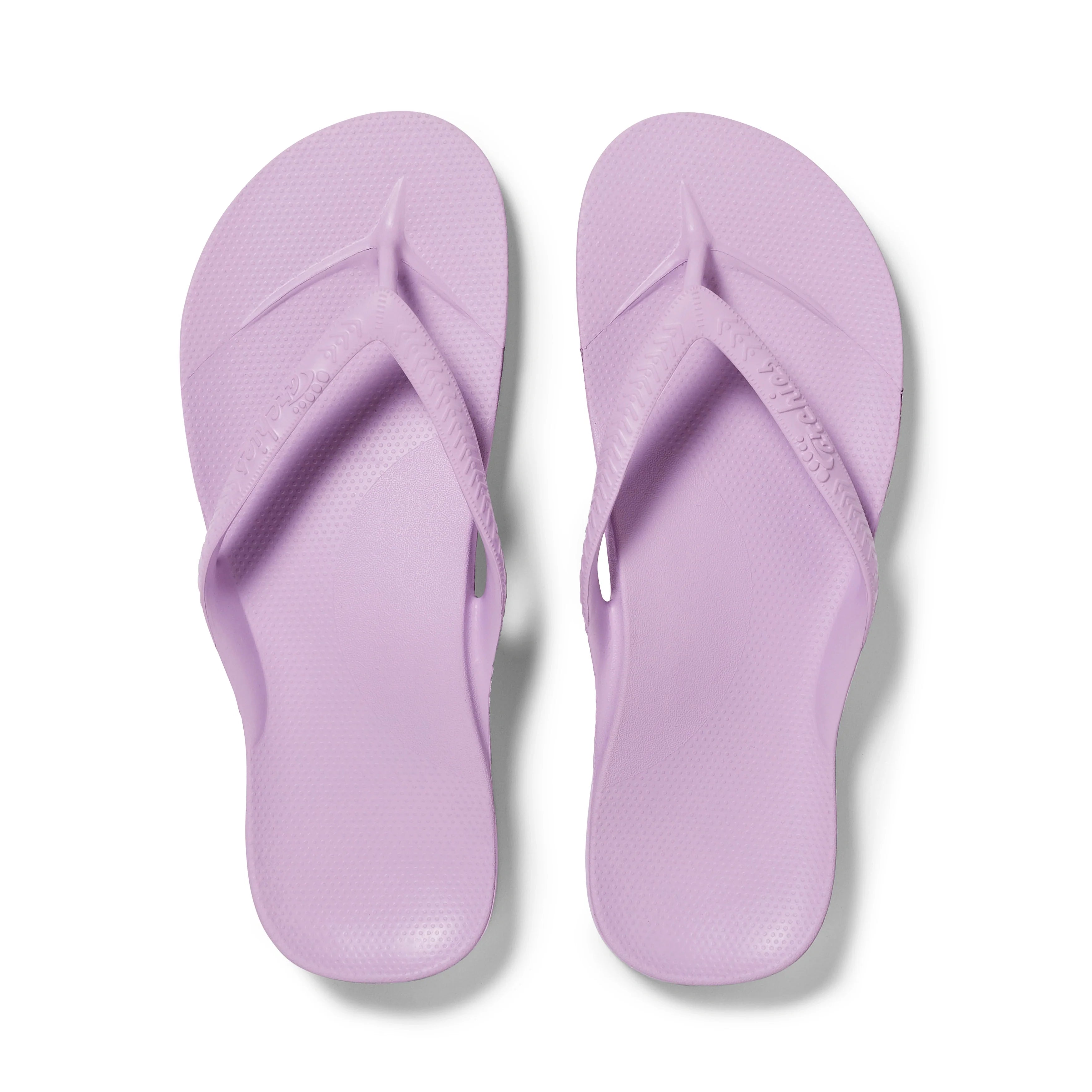 Archies arch support flip flops in lilac, shown as a pair from above on white background