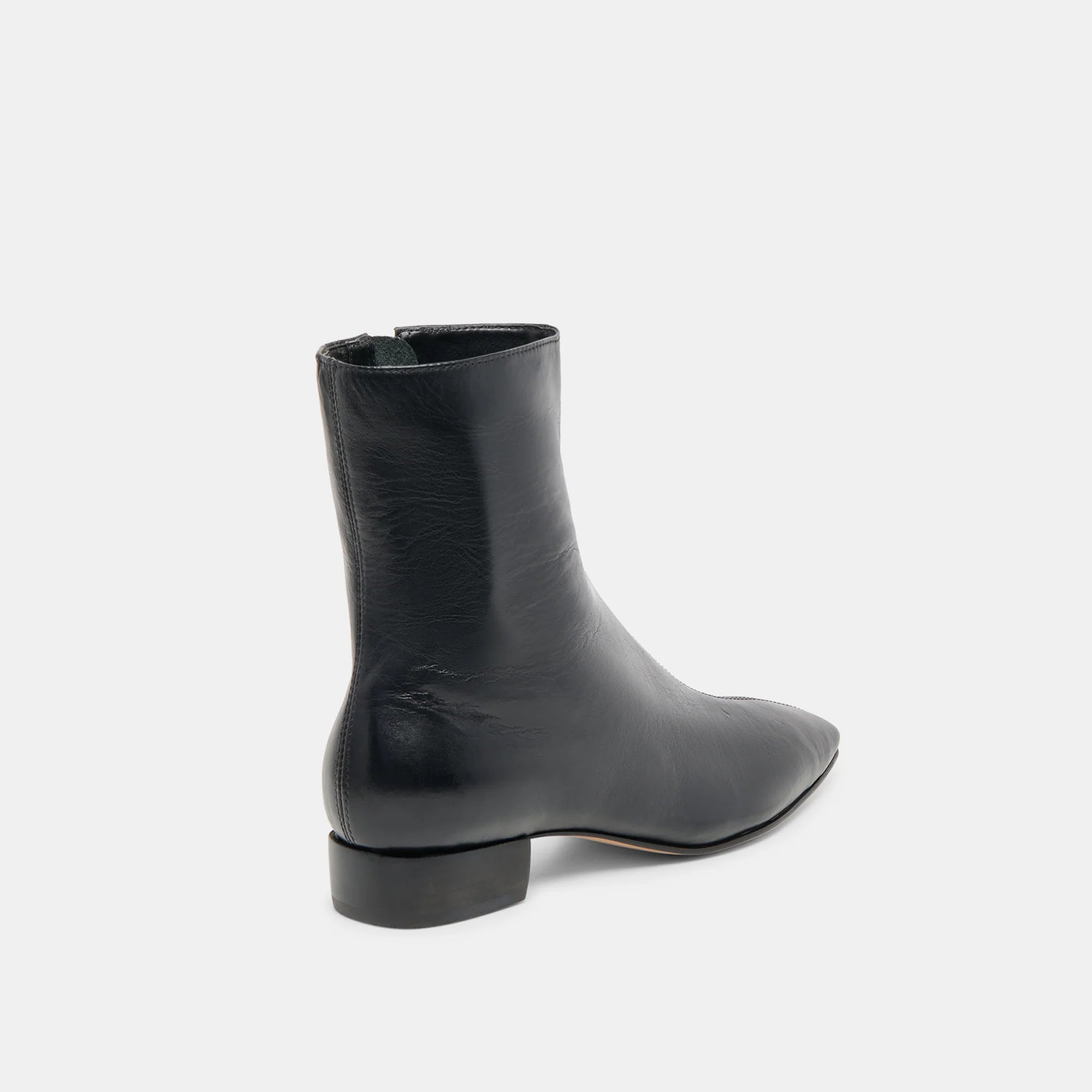 Dolce Vita Tarine black leather ankle boot with low block heel, back view