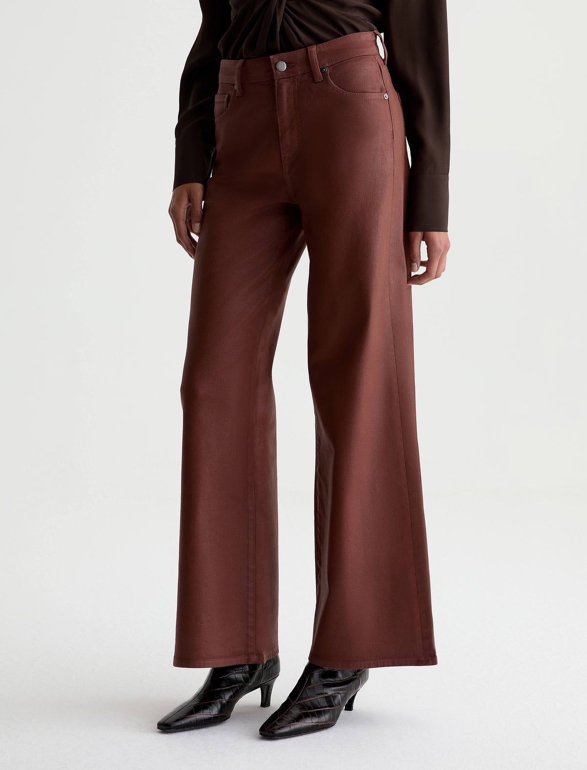 AG Saige Wide Leg pants in light chestnut brown worn by model with black heels