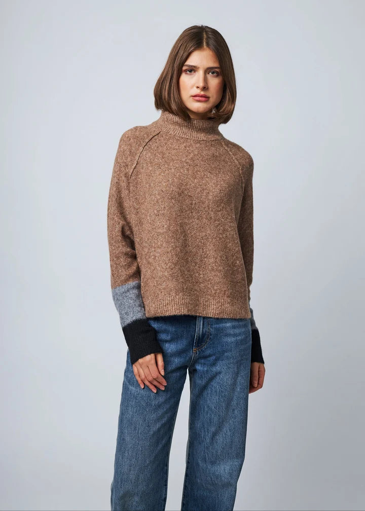Line the Label Pippa turtleneck sweater in tan with colorblock grey and black sleeves