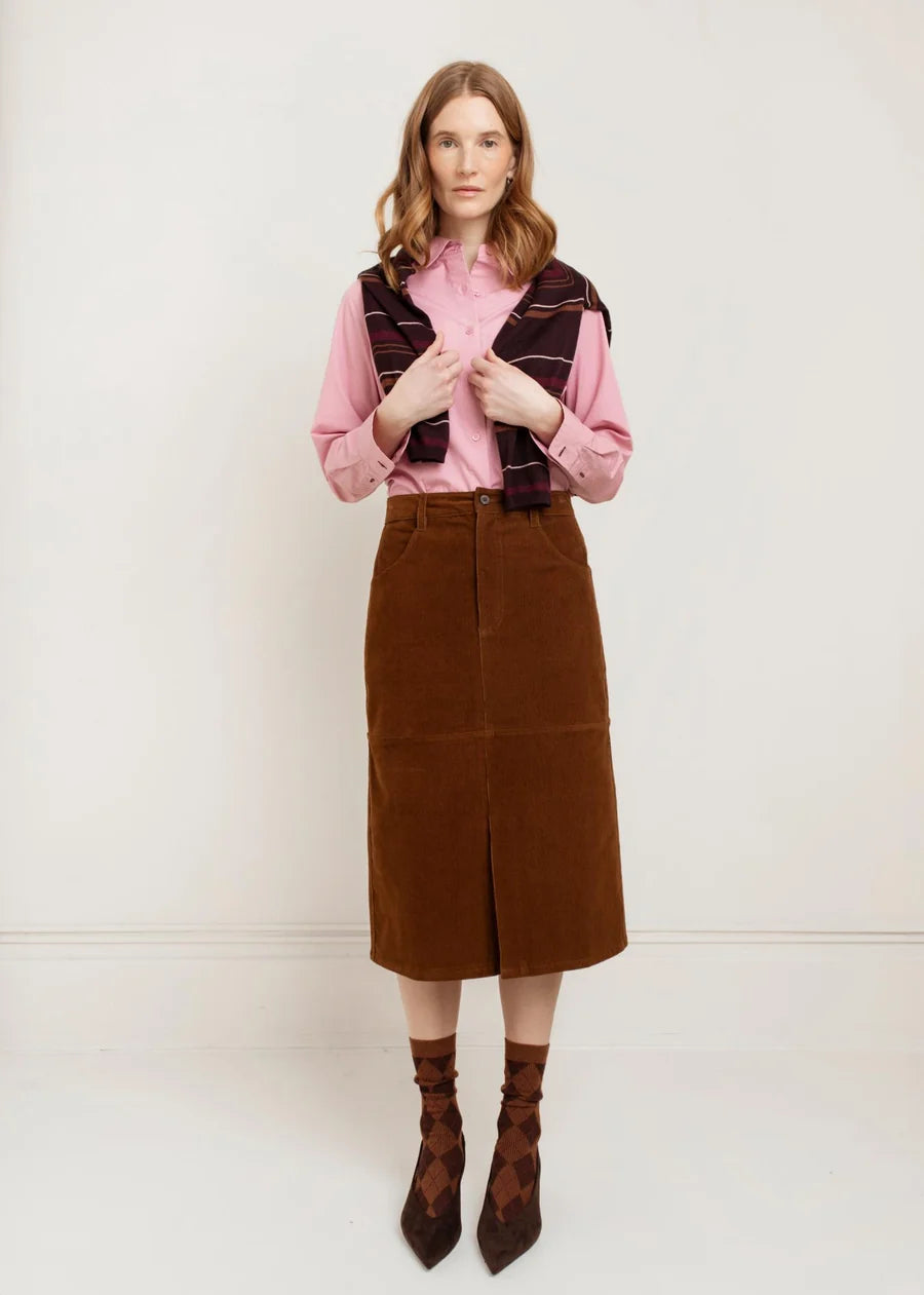 Brown corduroy midi skirt with front slit and single button waist closure