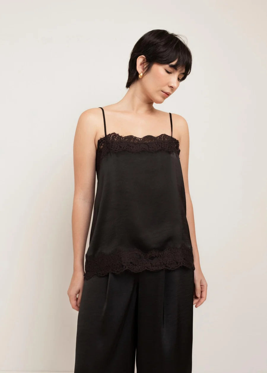 Black satin cami top with lace trim at neckline and hem, spaghetti straps