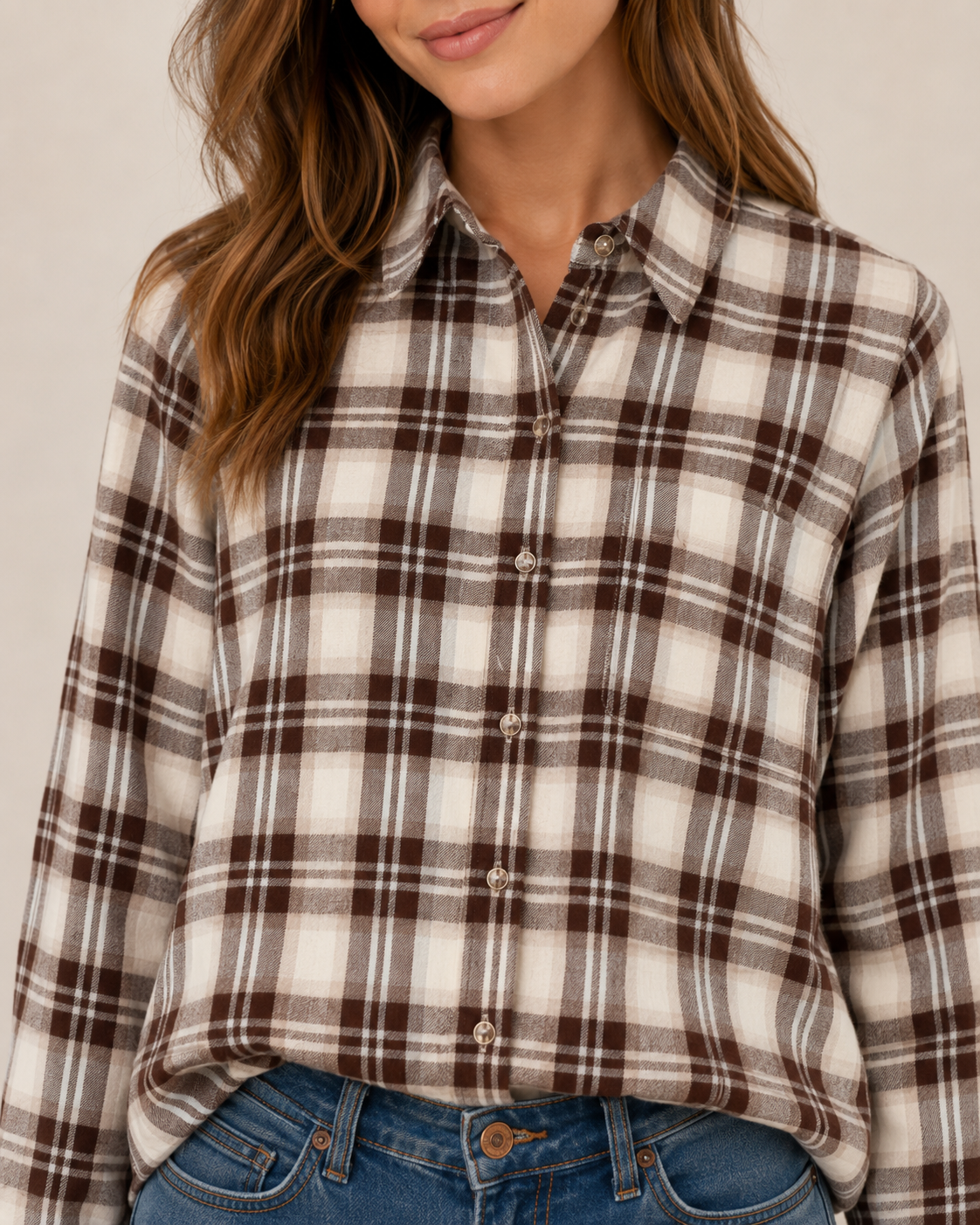 Woman wearing Rails Malin plaid flannel shirt in brown and cream birch hickory colorway