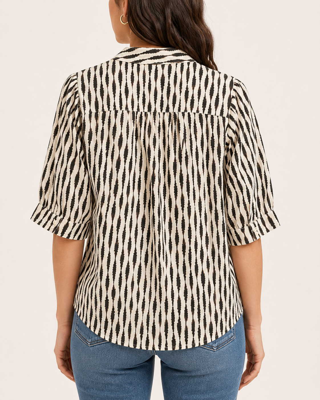 Back view of Sanctuary Eden Button Blouse in Ink Blot black and cream pattern with elbow sleeves