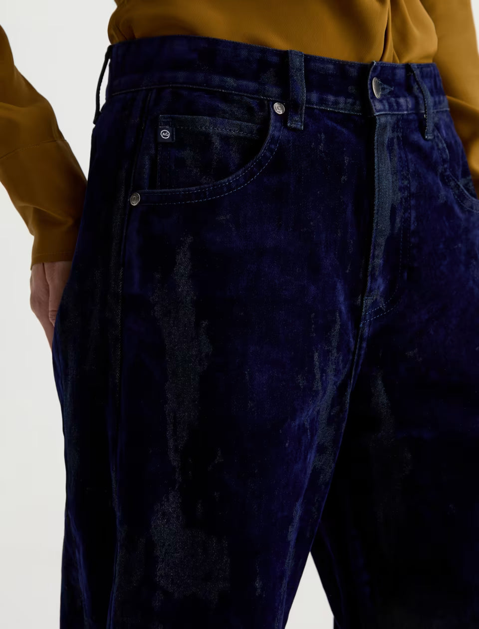 AG Hattie Ballroom navy velvet wide-leg jeans with silver hardware, close-up view