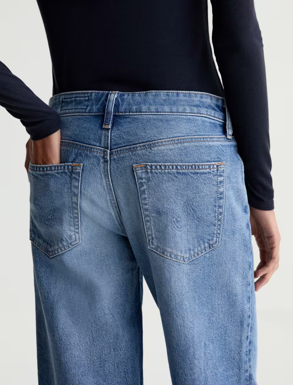 AG Adria wide-leg jeans in medium blue wash, back pocket detail view