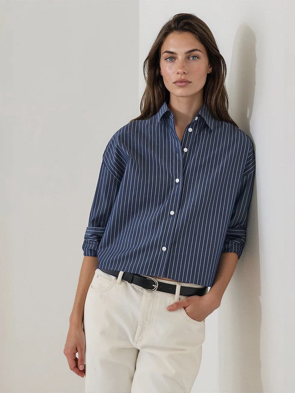 Oversized navy blue pinstripe cotton button-up boxy shirt with long sleeves