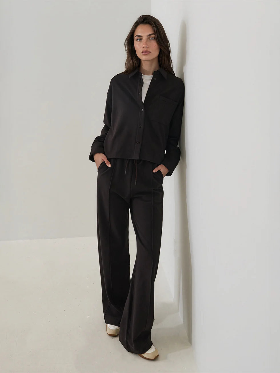 Women's dark brown boxy button-up shirt with collar and chest pocket