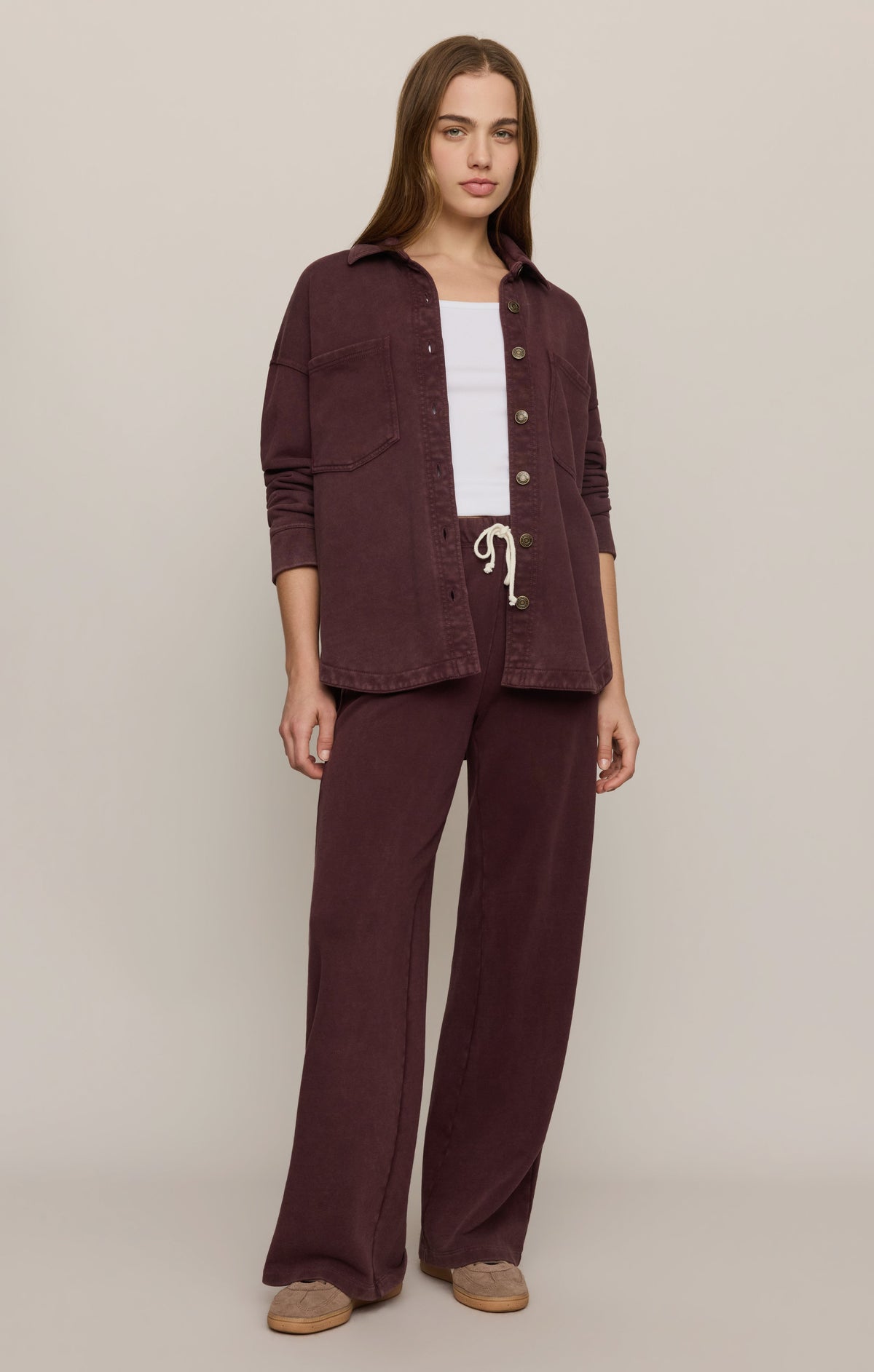 Model wearing Z Supply All Day Knit Jacket in Berry Noir with matching wide-leg pants