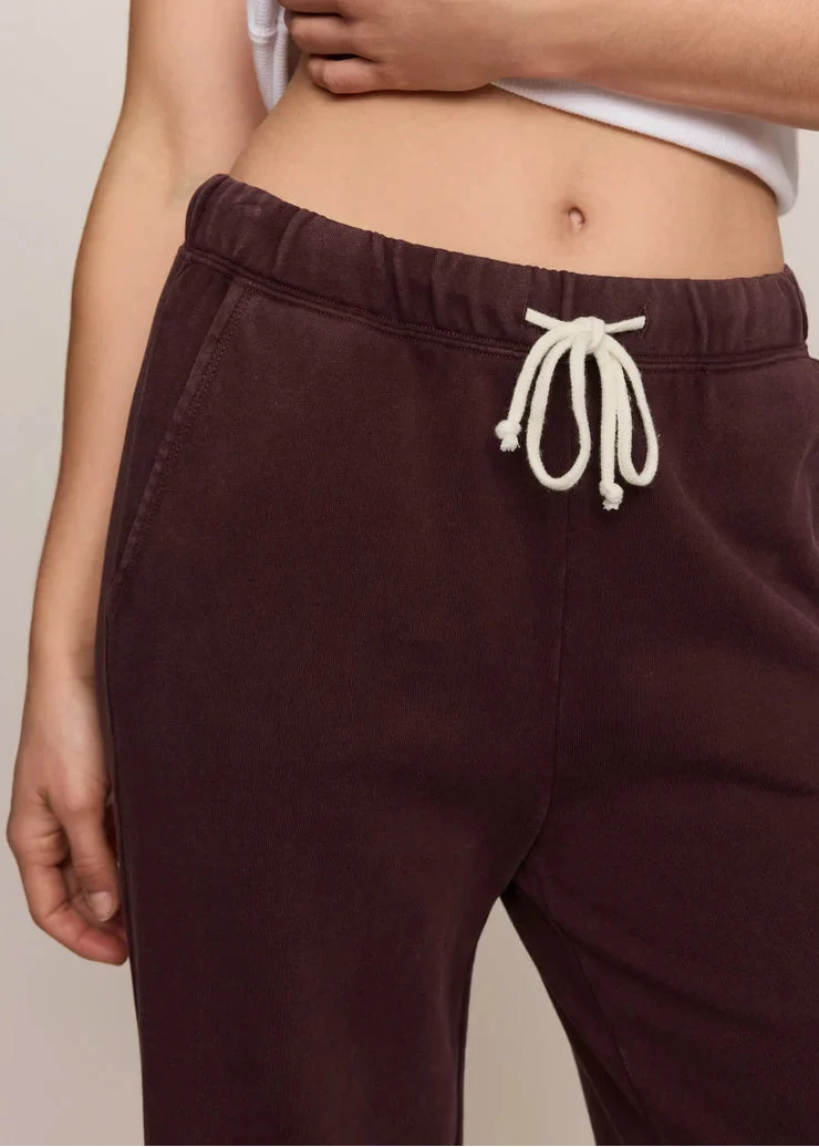 Close-up detail of Berry Noir knit sweatpants waistband with cream drawstring tie