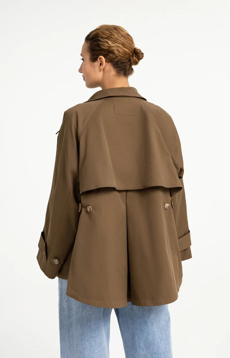 Olive brown A-line trench jacket with cape back detail, gold buttons, and cuffed sleeves