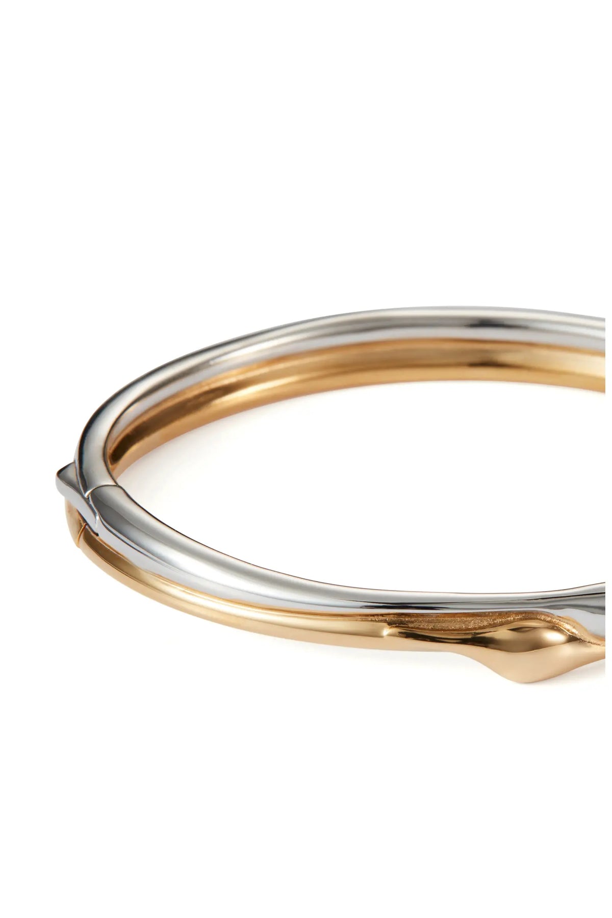 Jenny Bird Egret Bangle in interlocked gold and silver tones with twisted detail