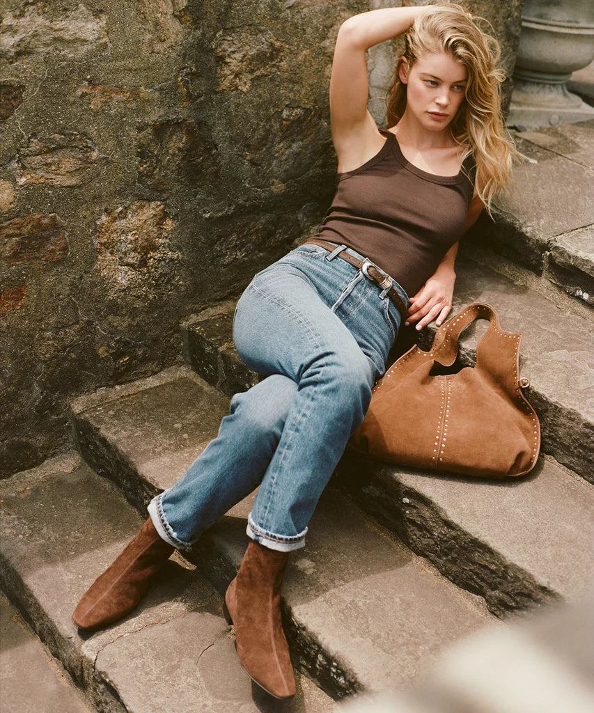 Tarine suede brown block heel ankle boots worn with cuffed blue jeans