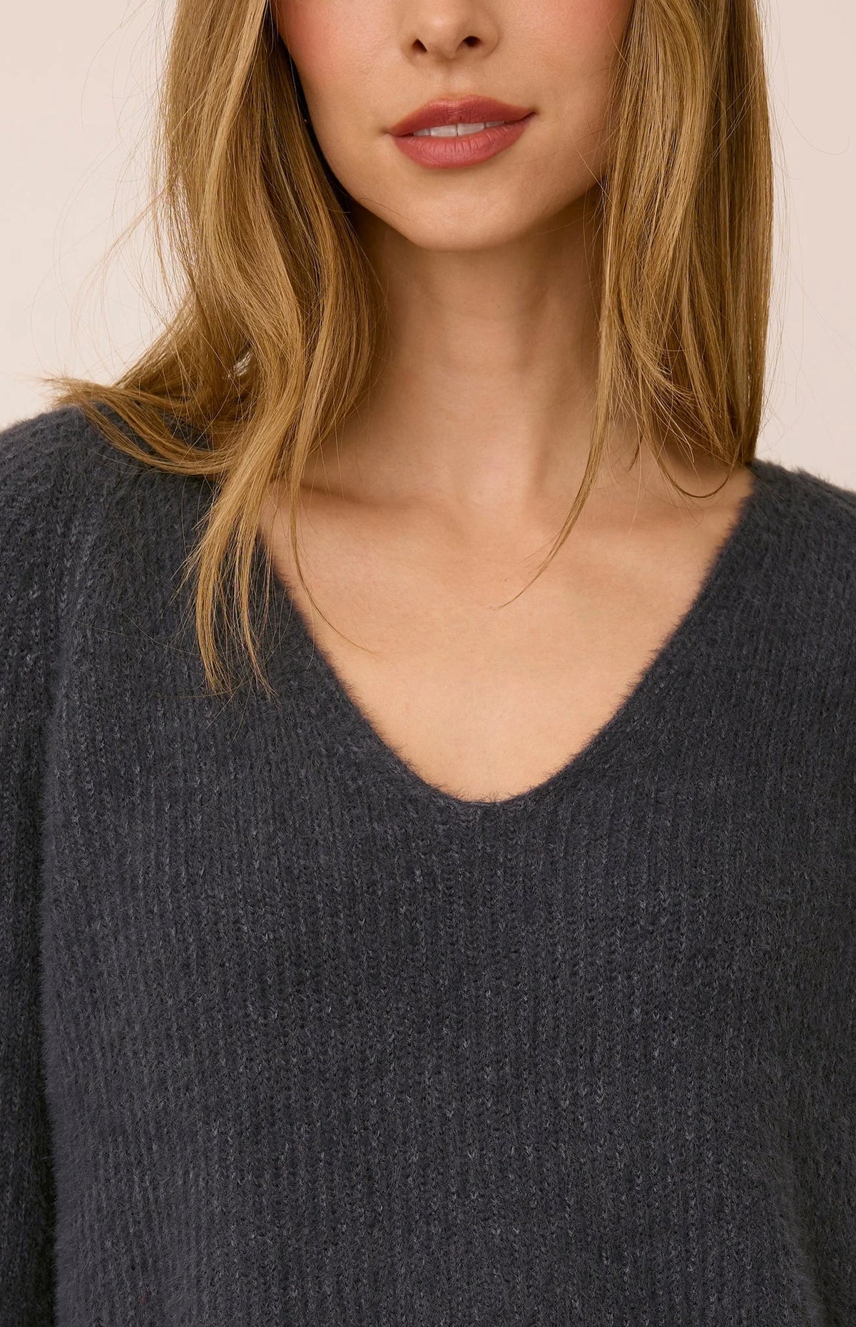 Smoke gray ribbed knit V-neck sweater with soft fuzzy texture, close-up view