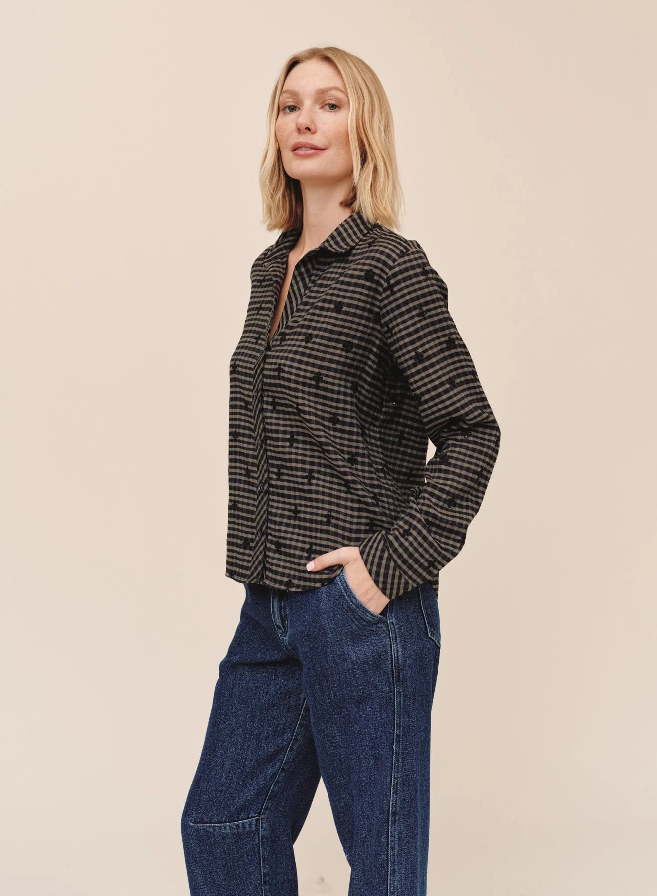 Long sleeve button down shirt in dark grey gingham with black floral embroidery