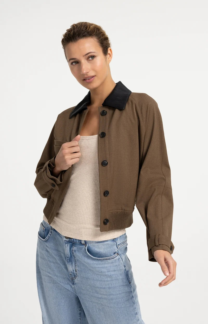 Olive brown cropped woven jacket with black faux leather collar and button front
