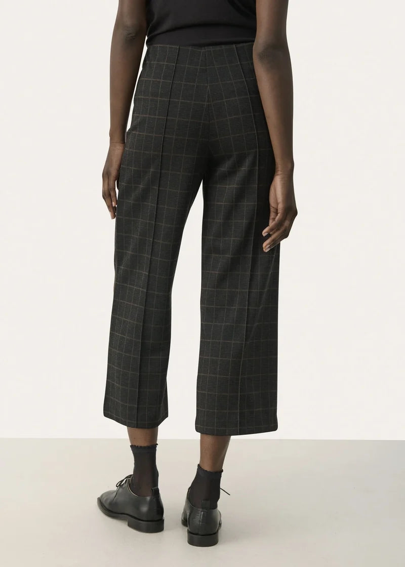 Grey check high-waist cropped wide-leg trousers with pressed front creases, back view