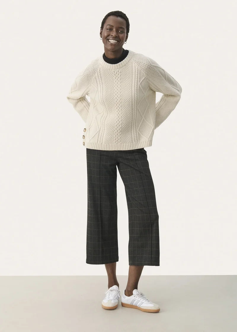 Dark grey check wide-leg cropped trousers with comfort waist, worn with white sneakers