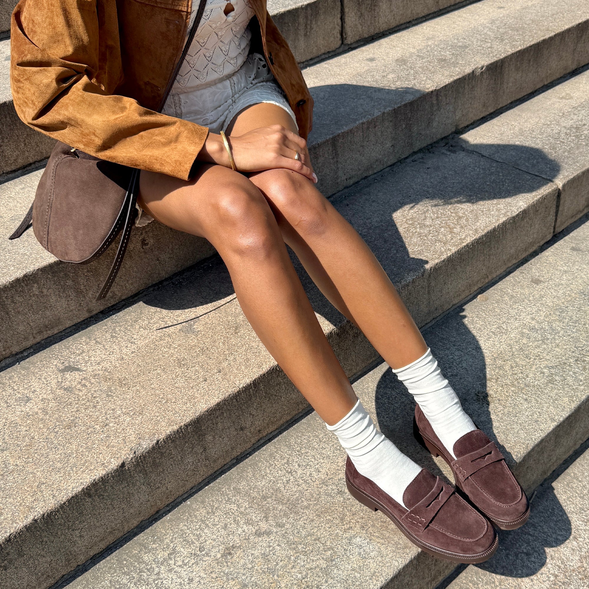 Dolce Vita Tiggy dark brown suede penny loafers worn with white crew socks