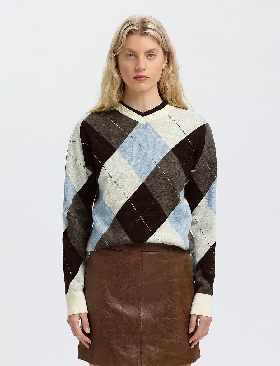 Argyle knit sweater in brown, cream, and blue with V-neck and long sleeves