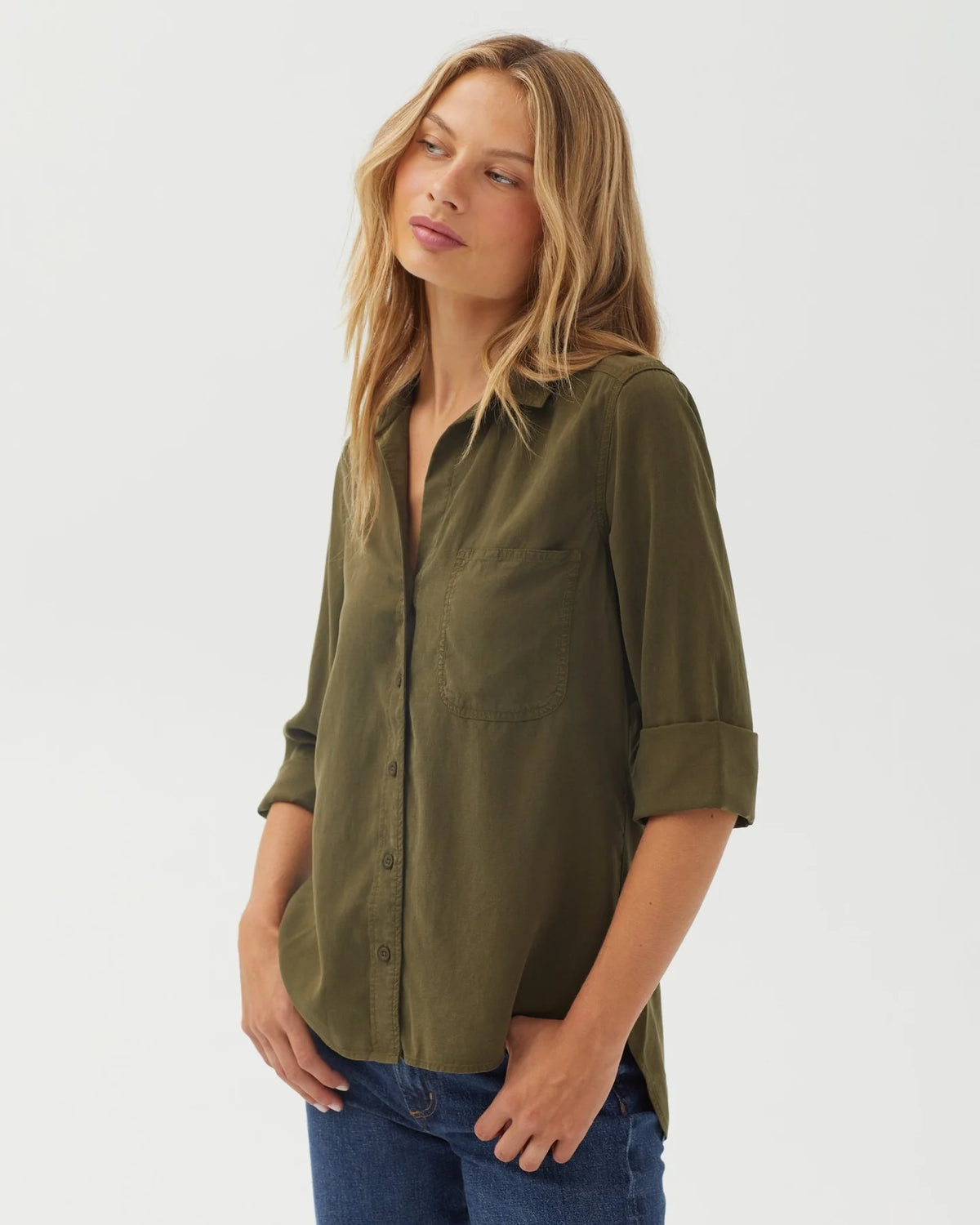 Olive green cropped button-down shirt with chest pocket and rolled sleeves