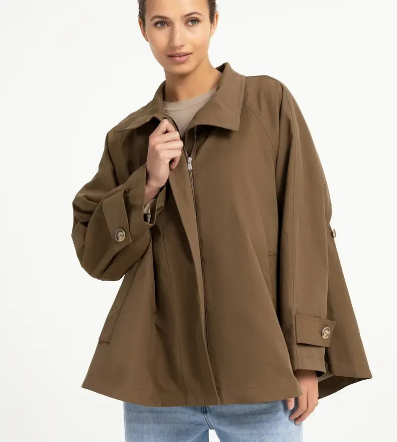 Olive green A-line trench jacket with zip front, wide sleeves, and button cuffs