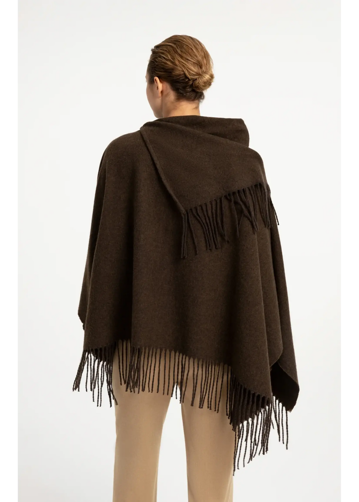 Dark brown hooded wool poncho with twisted self fringes, back view