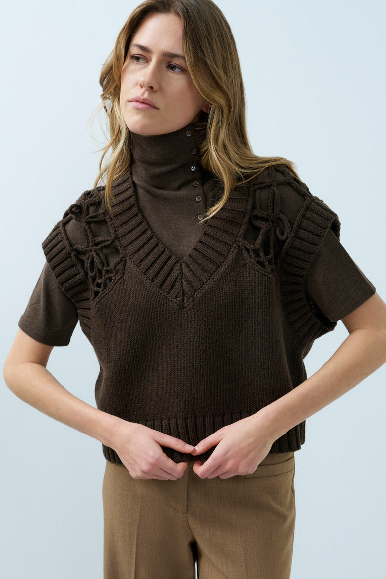 Dark brown knit sweater vest with V-neck and decorative shoulder stitch detail