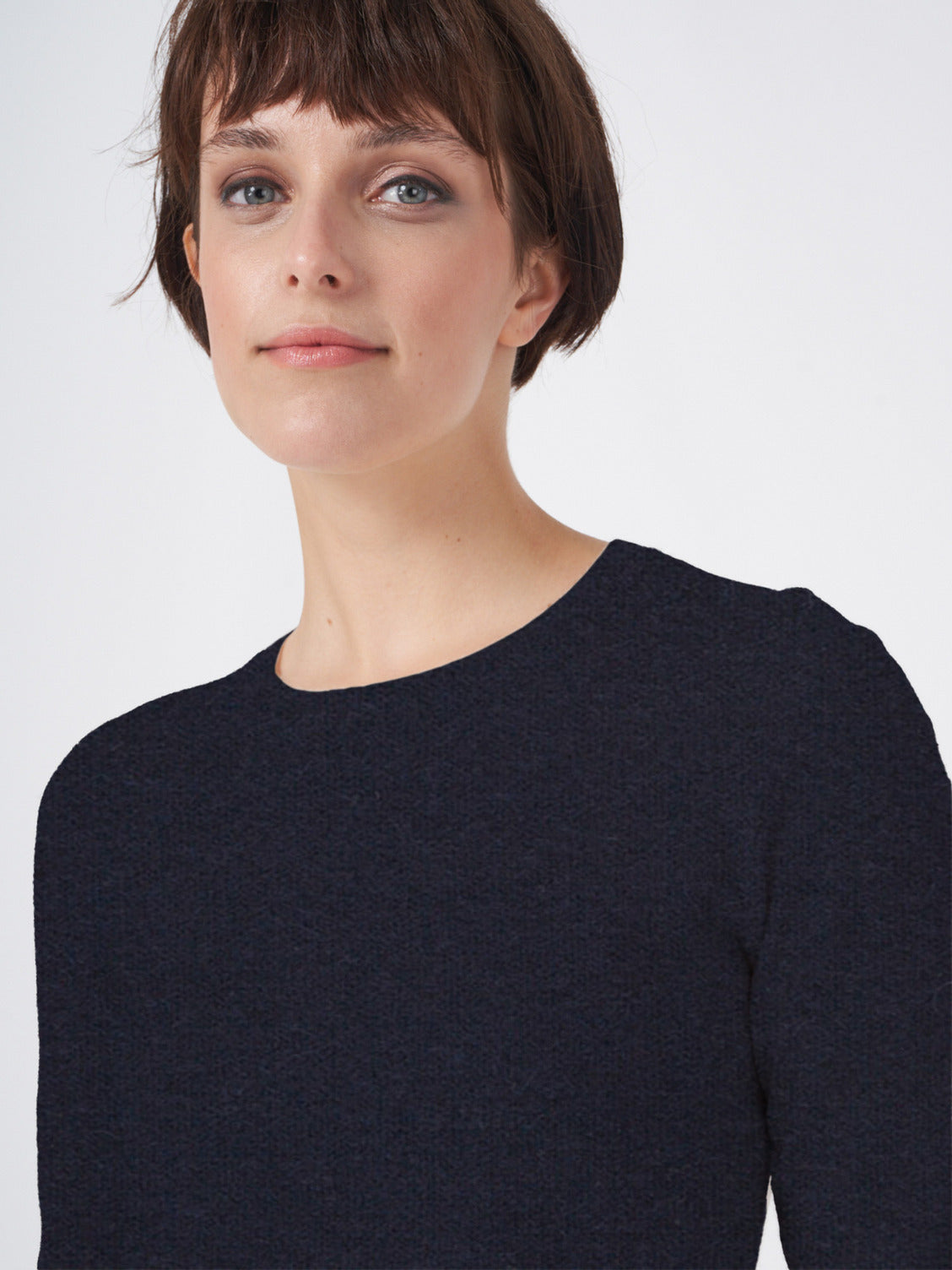 Dark navy crew neck cashmere knit pullover with textured weave, long sleeves