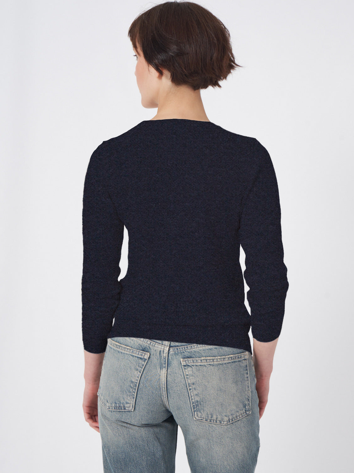 Navy blue cashmere knit pullover with three-quarter sleeves, shown from the back