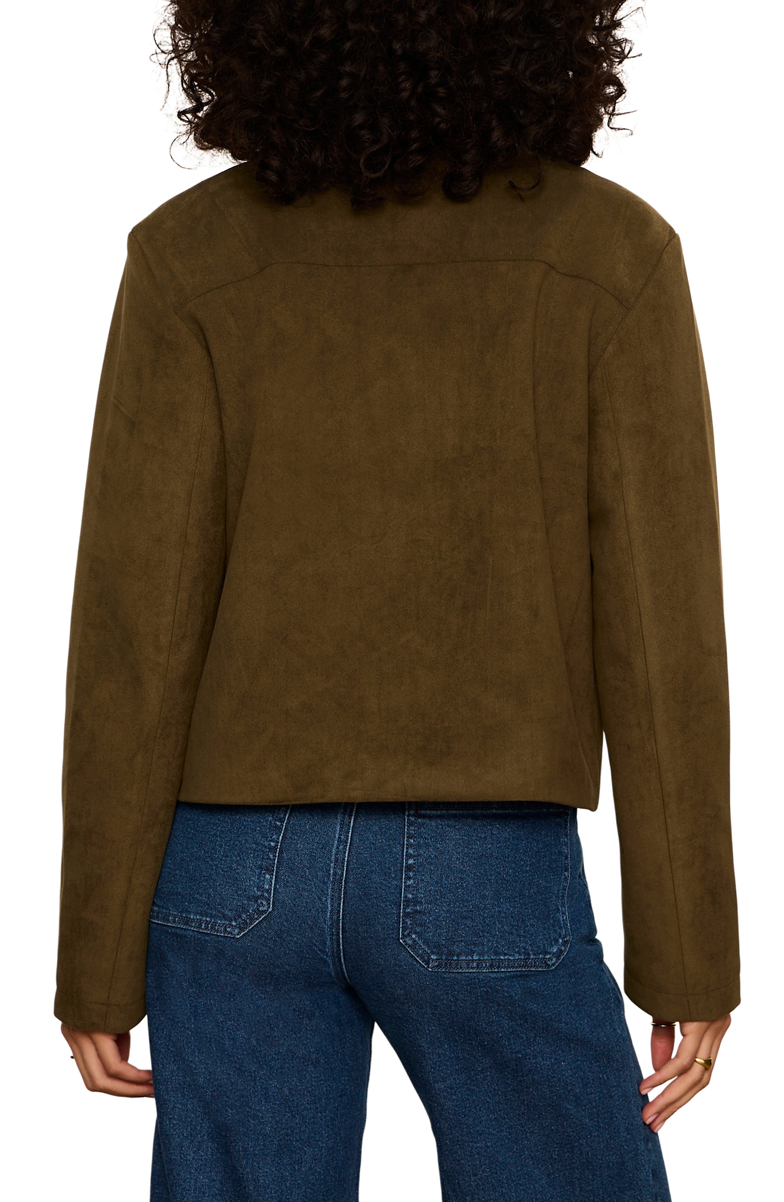Back view of Sanctuary Avid Suede Jacket in Light Kalamata olive green on model with blue jeans
