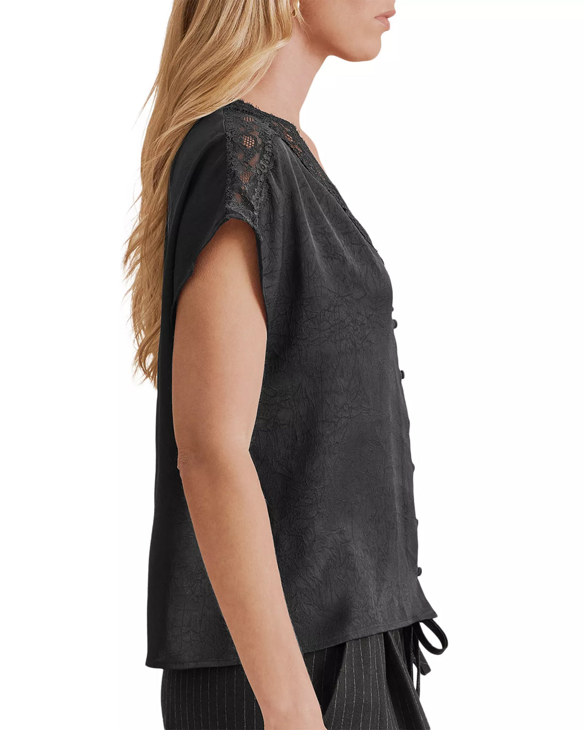 Black satin cap-sleeve top with lace trim shoulders and side button detail