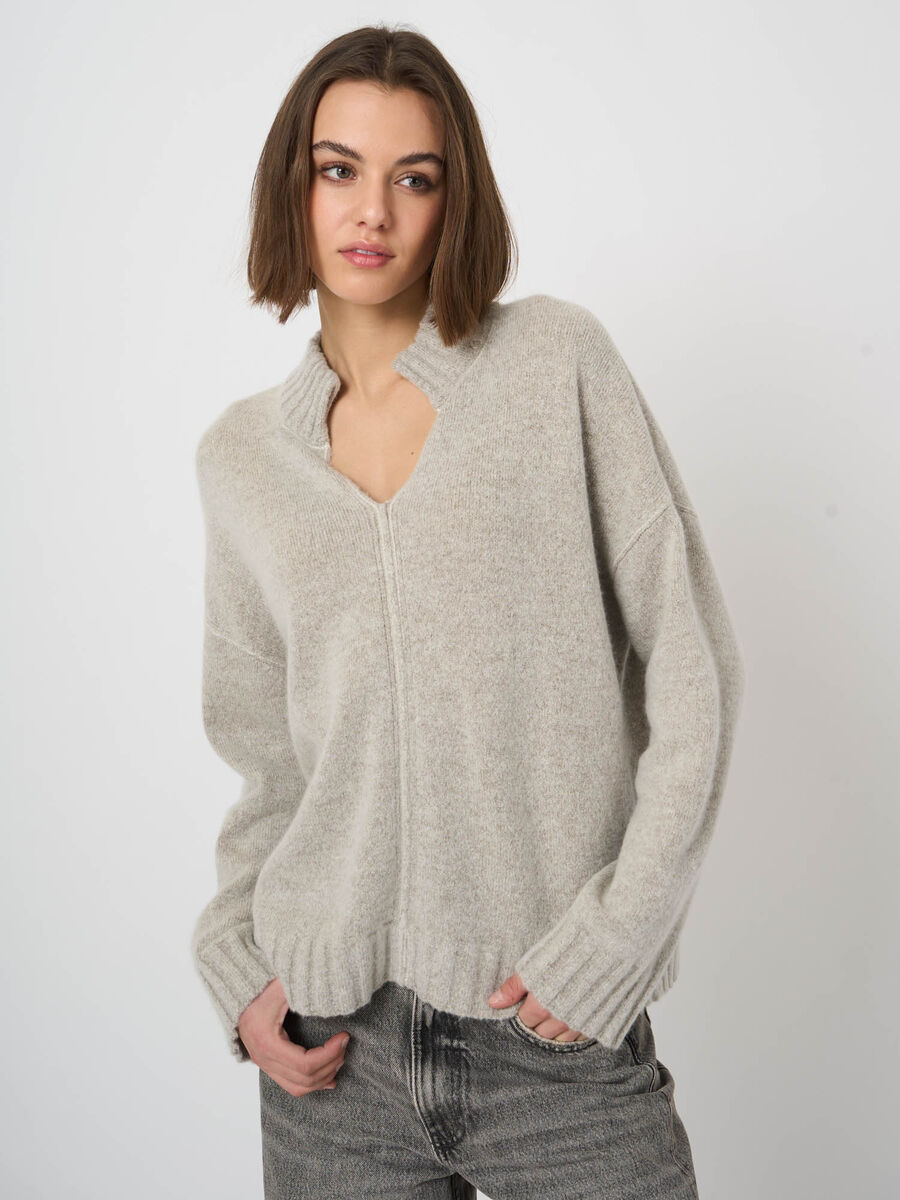 Oversized light gray wool cashmere V-neck pullover with ribbed stand collar and dropped shoulders