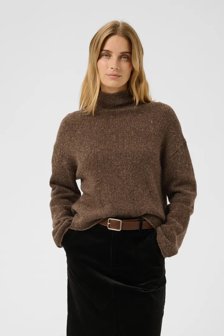 Brown speckled turtleneck pullover sweater with relaxed fit and ribbed knit texture