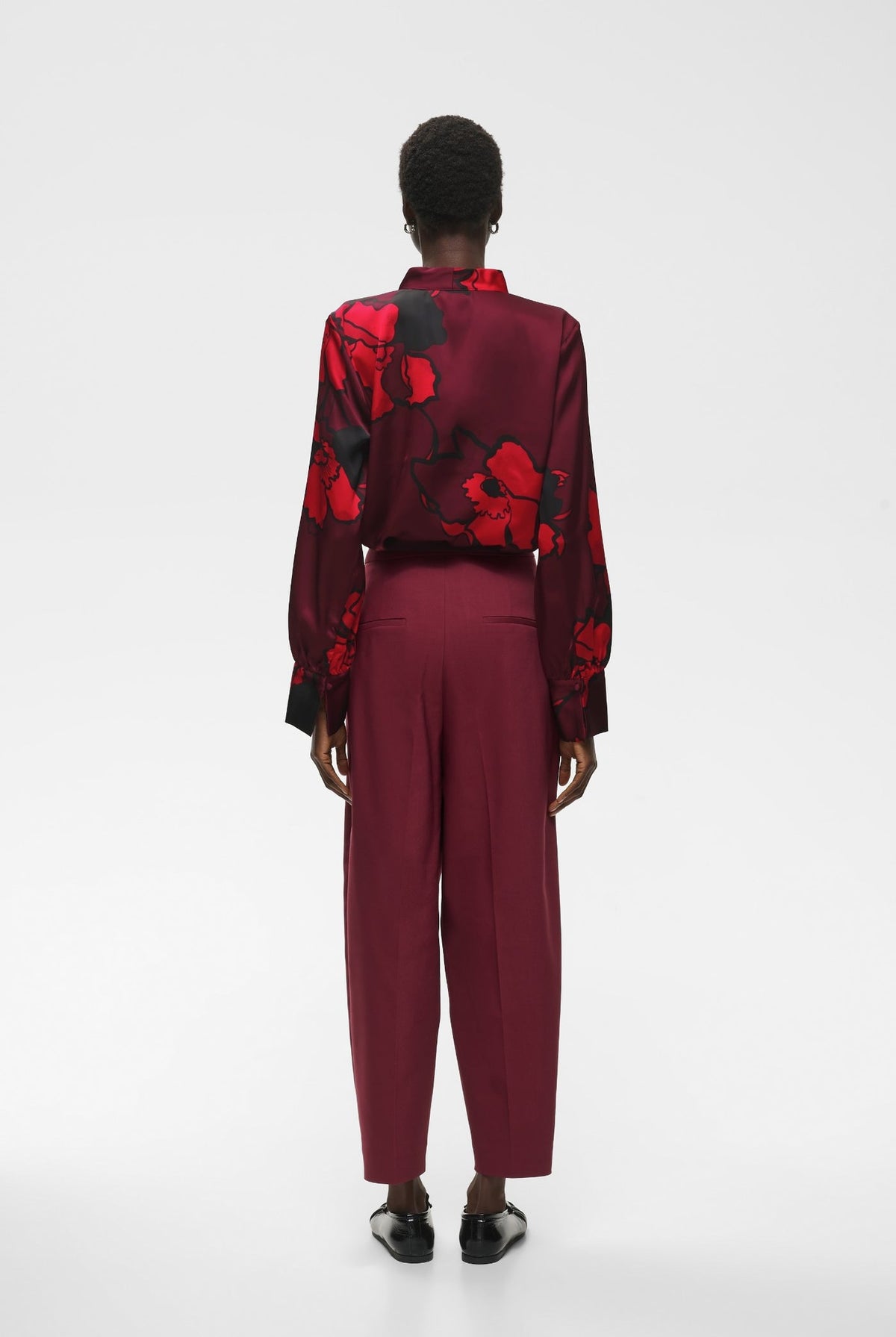 Burgundy floral print satin V-neck blouse with long sleeves, back view