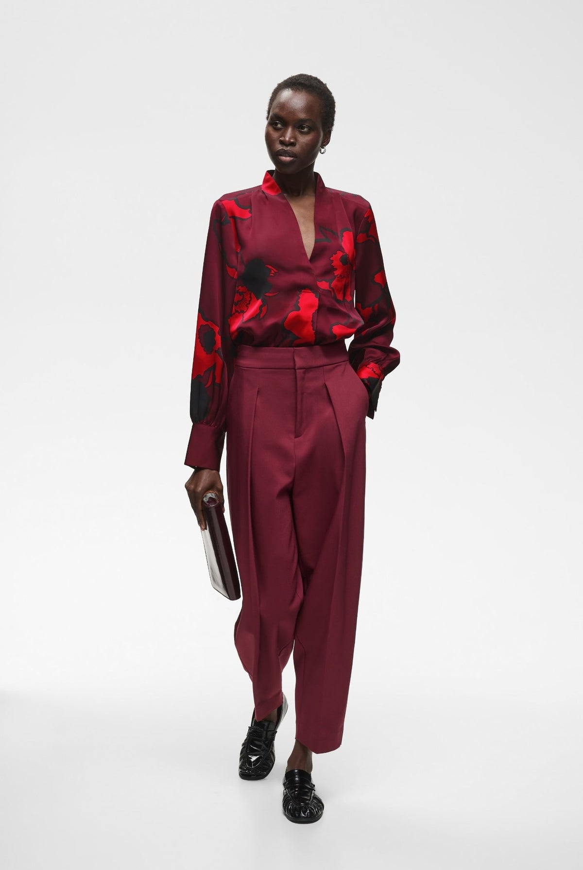 Burgundy floral print V-neck blouse with long sleeves and satin finish