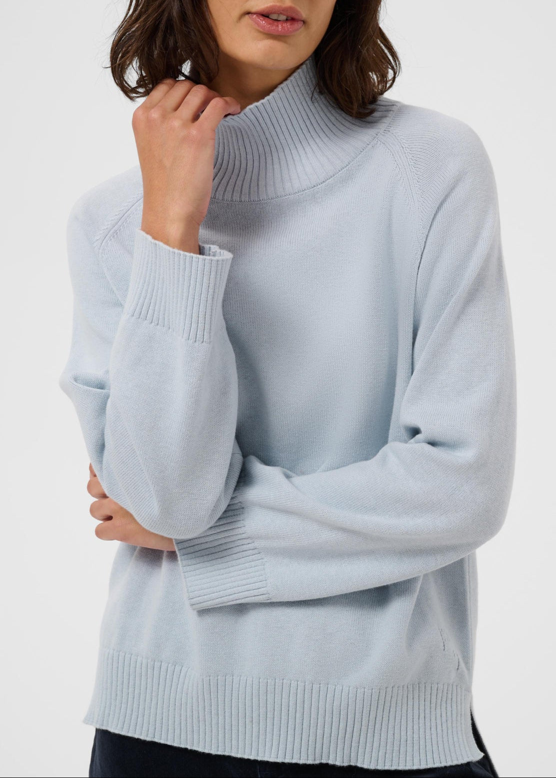 Woman wearing Part Two Chicky Pullover turtleneck sweater in soft gray dawn blue