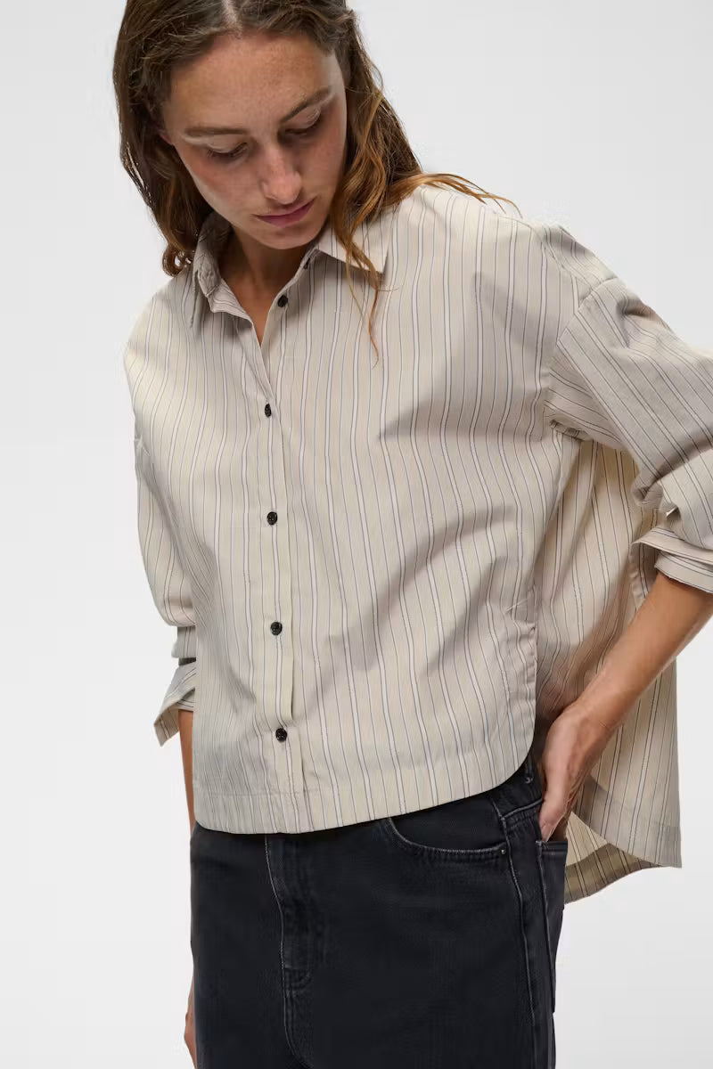 Cream striped button-up short shirt with long sleeves and collar