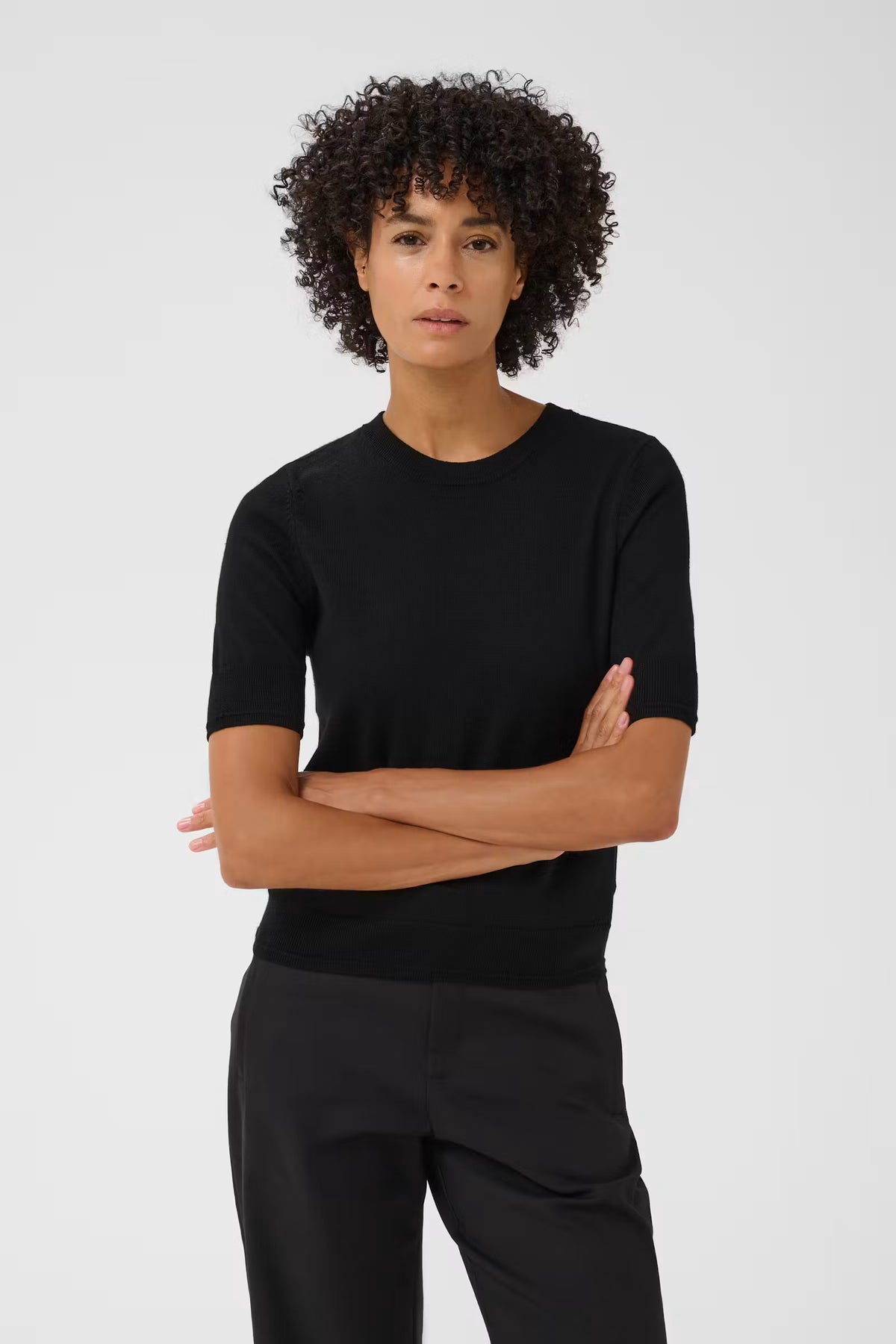 Part Two NATANYA black short-sleeve fine knit top with crew neck, worn by model