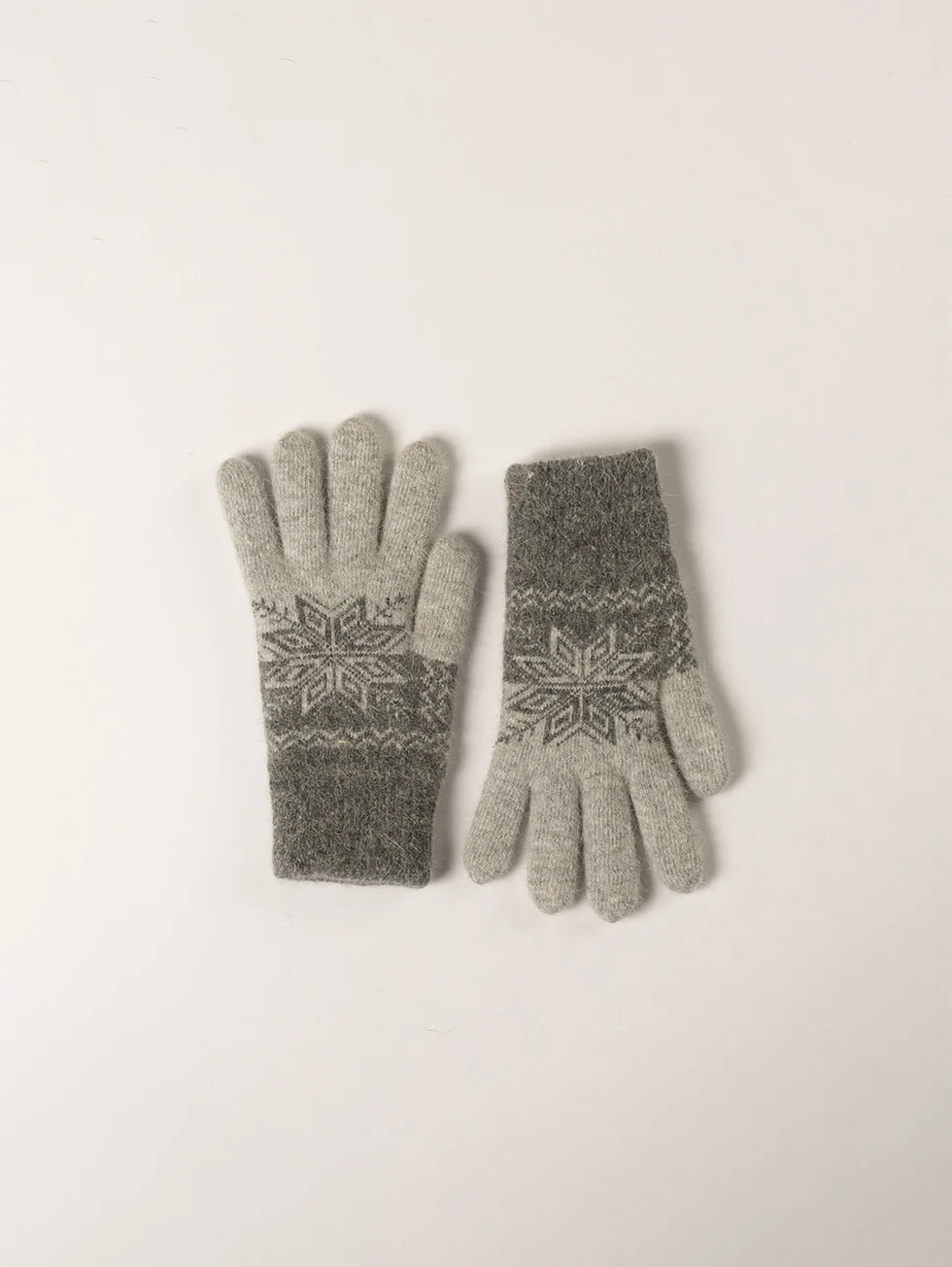 Light grey knit gloves with dark grey Fair Isle snowflake pattern