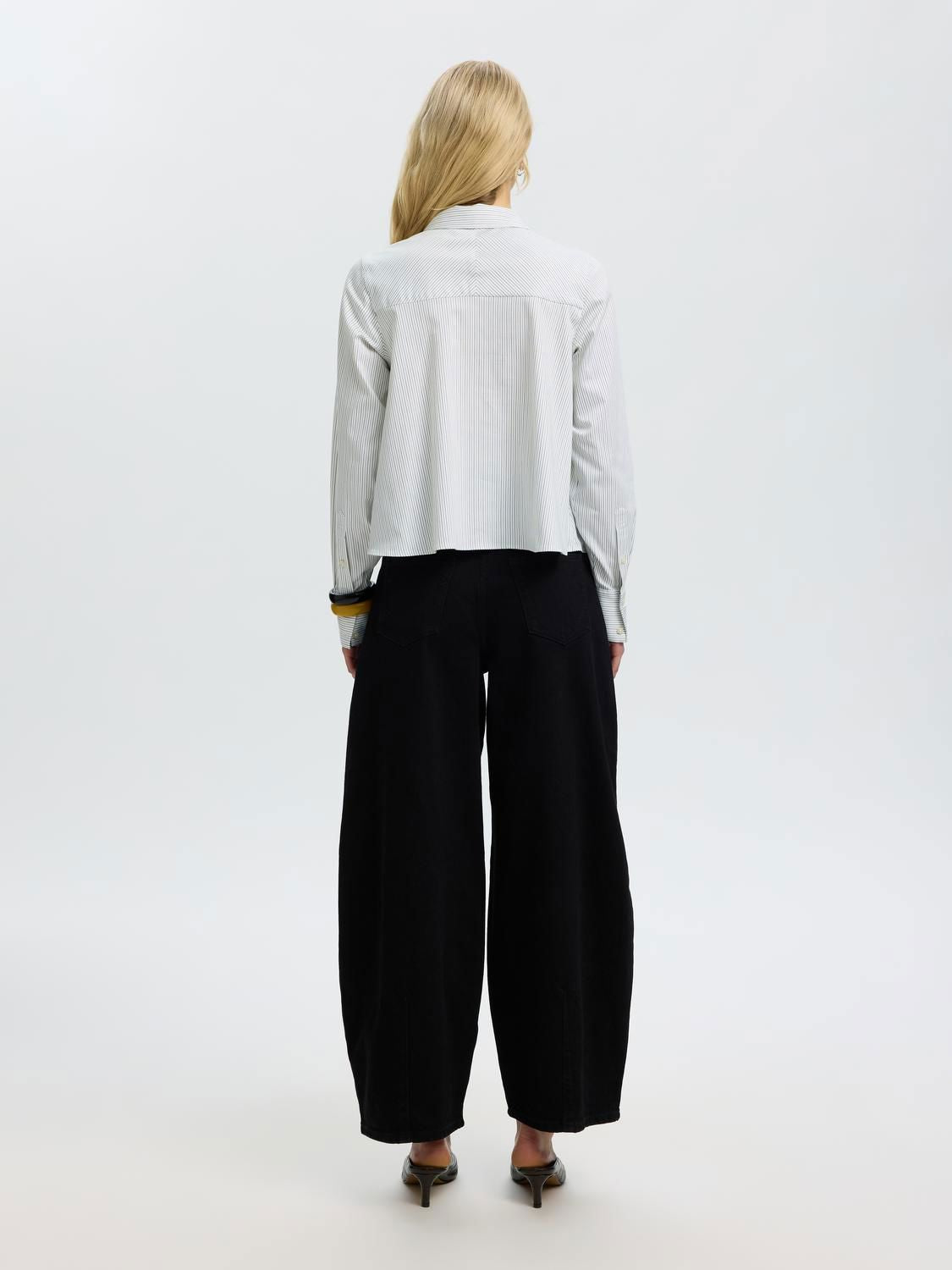 Back view of SELECTED relaxed striped shirt in white with vertical stripes, cropped length