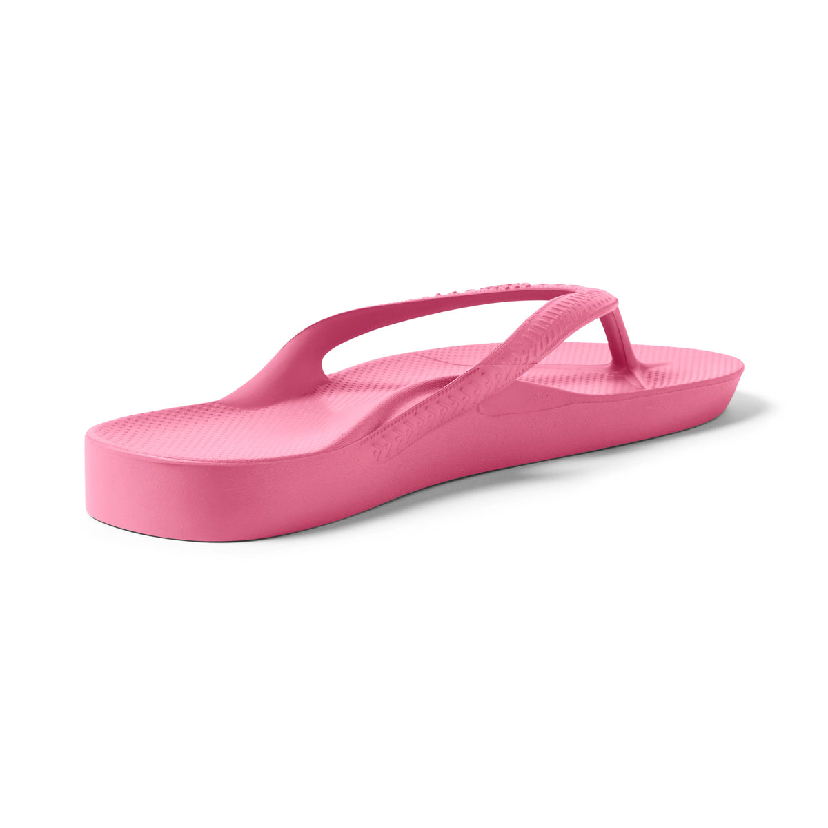 Archies arch support flip flops in hot pink shown from rear three-quarter angle