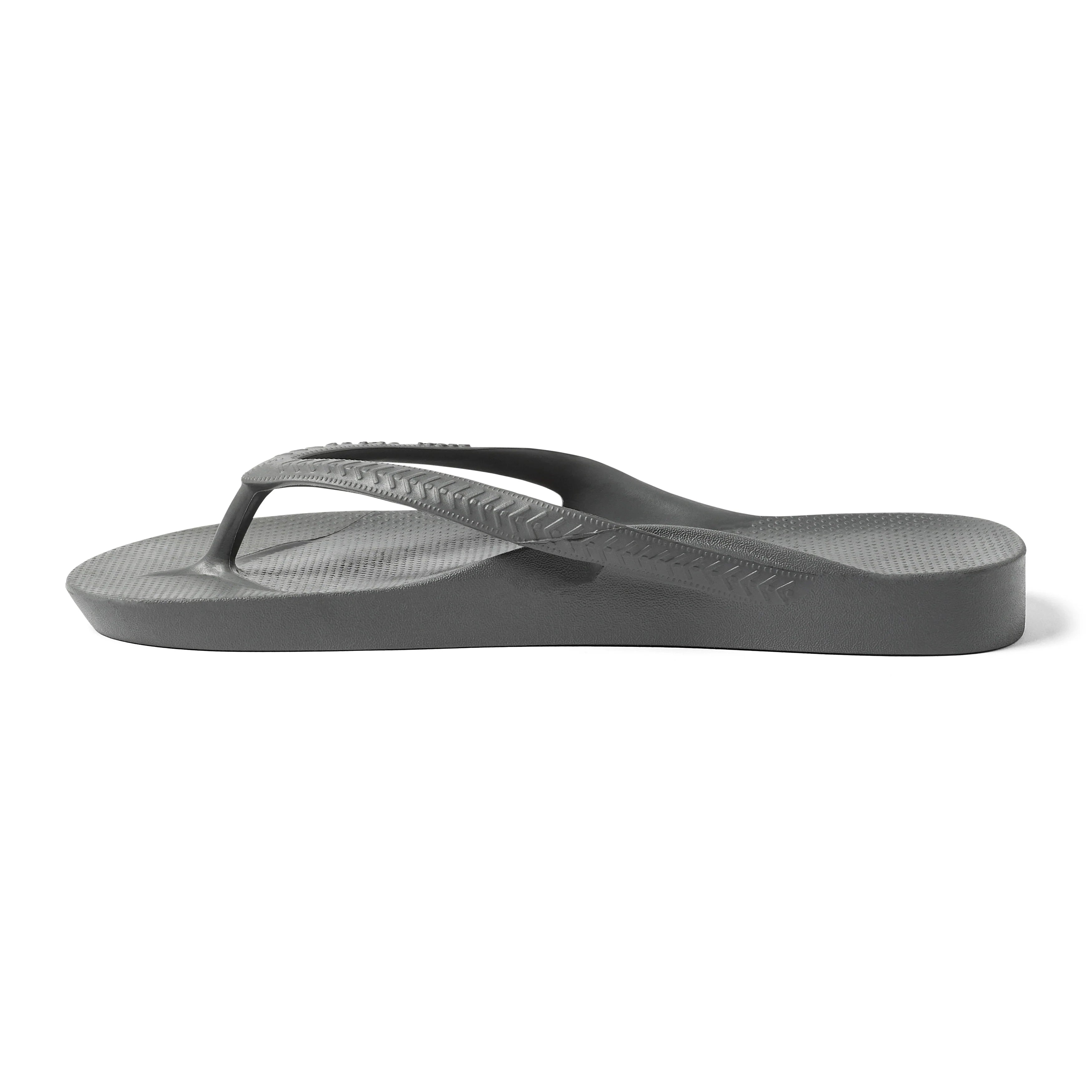 Archies arch support flip flop in charcoal grey, side profile view on white background